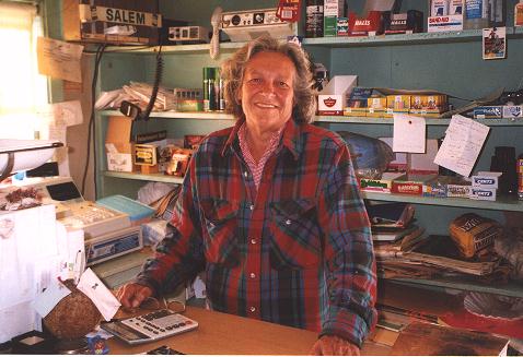 Sue behind counter